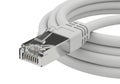 Close-up view of an ethernet cable with an rj45 connector attached Royalty Free Stock Photo