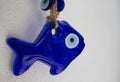 Close up view of an evil eye in shape of fish Royalty Free Stock Photo