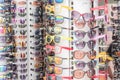 Colorful trendy sunglasses and shade on rack display at Little India, Singapore Royalty Free Stock Photo