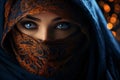 A close-up view of the face of a young woman wearing a blue decorated niqab Ramadan as a time of fasting and prayer for Muslims