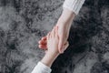 Close up view of family holding hands, loving caring mother supporting child. Helping hand and hope concept Royalty Free Stock Photo