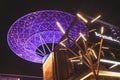 Close-up view of a famous Dubai tourist attraction - futuristic glowing metal super trees on