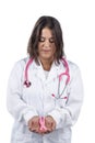 Female doctor holding pink breast cancer ribbon Royalty Free Stock Photo