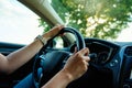 Inside view of woman driving car on countryside road Royalty Free Stock Photo