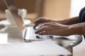 Close up view female hands typing on laptop Royalty Free Stock Photo