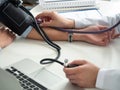 Close up view of female medicine doctor measuring blood pressure Royalty Free Stock Photo