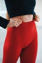 Close up view of female model posing and demonstrating comfortable activewear Royalty Free Stock Photo