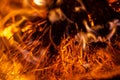 Close up view of flames. Sparks from the bonfire Royalty Free Stock Photo