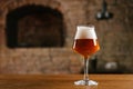 close-up view of fresh cold beer in glass on wooden table Royalty Free Stock Photo