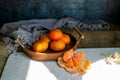 Fresh Mandarins in the basket On Table Royalty Free Stock Photo