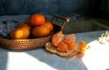 Fresh Mandarins in the basket On Table Royalty Free Stock Photo