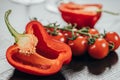 close-up view of fresh sliced healthy pepper and cherry tomatoes