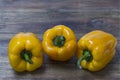 Close up view of fresh yellow paprika isolated on  wooden background. Healthy eating concept Royalty Free Stock Photo