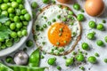 Close up view of a fried egg topped with ground pepper and surrounded by green peas on white surface Royalty Free Stock Photo