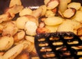 Close up view on fried potatoes during cooking Royalty Free Stock Photo