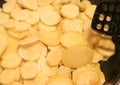 Close up view on fried potatoes during cooking Royalty Free Stock Photo