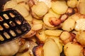 Close up view on fried potatoes during cooking Royalty Free Stock Photo