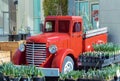 Close up view of the front end of a beautifully restored vintage truck automobile. Old vintage American red pickup car Royalty Free Stock Photo