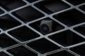 Close up view of front parking assist video camera on the car. Royalty Free Stock Photo