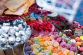 Close up view at fruit jellies and macaroons