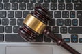 Close up view on gavel and computer keyboard. Internet security laws concept Royalty Free Stock Photo