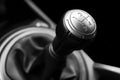 Close up view of a gear lever shift. Manual gearbox. Car interior details. Car transmission. Soft lighting. Abstract view. Black Royalty Free Stock Photo