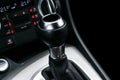 Close up view of a gear lever shift. Manual gearbox. Car interior details. Car transmission. Soft lighting. Abstract view. Car det Royalty Free Stock Photo