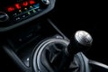 Close up view of a gear lever shift. Manual gearbox. Car interior details. Car transmission. Soft lighting. Abstract view Royalty Free Stock Photo