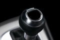 Close up view of a gear lever shift. Manual gearbox. Car interior details. Car transmission. Soft lighting. Abstract view. Car det Royalty Free Stock Photo