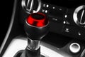 Close up view of a gear lever shift. Manual gearbox. Car interior details. Car transmission. Soft lighting. Abstract view. Car det Royalty Free Stock Photo