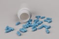 Close up view of generic blue pills. Opiate and heroin overdoses have skyrocketed in recent years IV