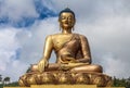 Close up view of giant Buddha Dordenma statue with the blue sky and clouds background, Thimphu, Bhutan Royalty Free Stock Photo