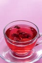 Close up view of glass cup with rose tea Royalty Free Stock Photo