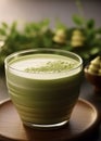 Close up view of glass cup with Green Matcha Tea Royalty Free Stock Photo