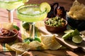 Margaritas with nachos and guacamole. Royalty Free Stock Photo
