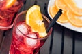 Close-up of view of glasses of spritz aperitif aperol cocktail with orange slices and ice cubes