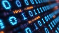 Close-up view of glowing binary code displayed on a modern digital interface Royalty Free Stock Photo
