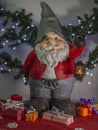 Close up view of gnome figure on Christmas decoration background.