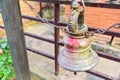 Close-Up View of a Golden Nepali Temple Bell