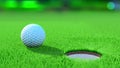 Close up view of a golf ball on the green near the hole Royalty Free Stock Photo