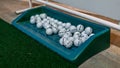 The close up view of the golf balls in the basket Royalty Free Stock Photo