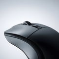 A Close-up view of a Gray Computer Mouse with an Ergonomic Design. Royalty Free Stock Photo