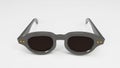 Close-up view of gray sunglasses isolated on the white surface Royalty Free Stock Photo