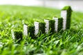 Row of Dominos in Grass Generative AI Royalty Free Stock Photo