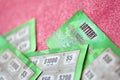 Close up view of green lottery scratch cards. Many used fake instant lottery tickets with gambling results. Gambling addiction Royalty Free Stock Photo