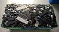 Recycling Bin Overflowing with Discarded Computer Keyboards and Mice Royalty Free Stock Photo