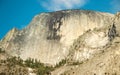 Close up view of Half Dome mountain from the Mirror Lake trail. It is a well-known rock formation in the Yosemite National Park, Royalty Free Stock Photo