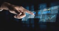 Futuristic interface with hand interacting with data visualizations, graphs, charts, and statistics on digital screen Royalty Free Stock Photo