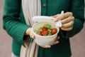 Close up view of hand of woman having a vegetables salad for lunch Royalty Free Stock Photo