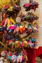 Close-up view of the handmade elephant key chain selling at the souvenirs stall at Chatuchak weekend market in Bangkok